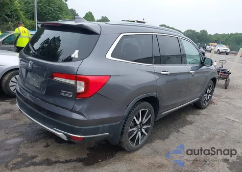 2020 Honda Pilot Awd Touring 7 Passenger z USA, uszkodzony, nr VIN 5FNYF6H67LB006686